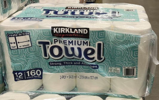 Kirkland Premium Towel packages stacked in a warehouse setting