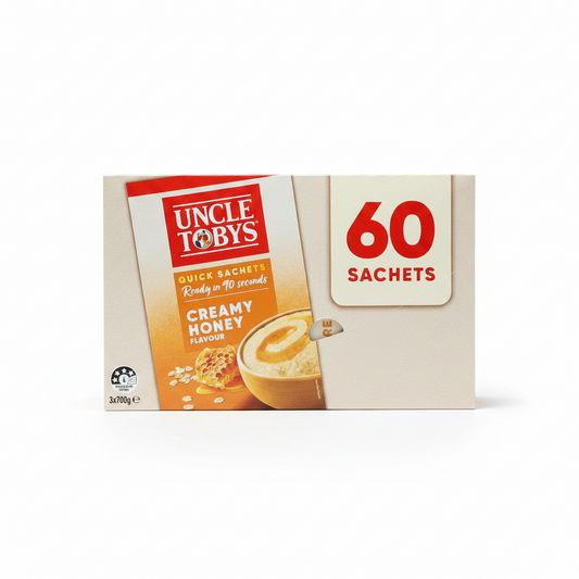 Uncle Toby's Creamy Honey flavor quick sachets packaging on a white background