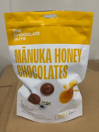 THE CHOCOLATE GUYS MANUKA HONEY CHOCOLATES 500G